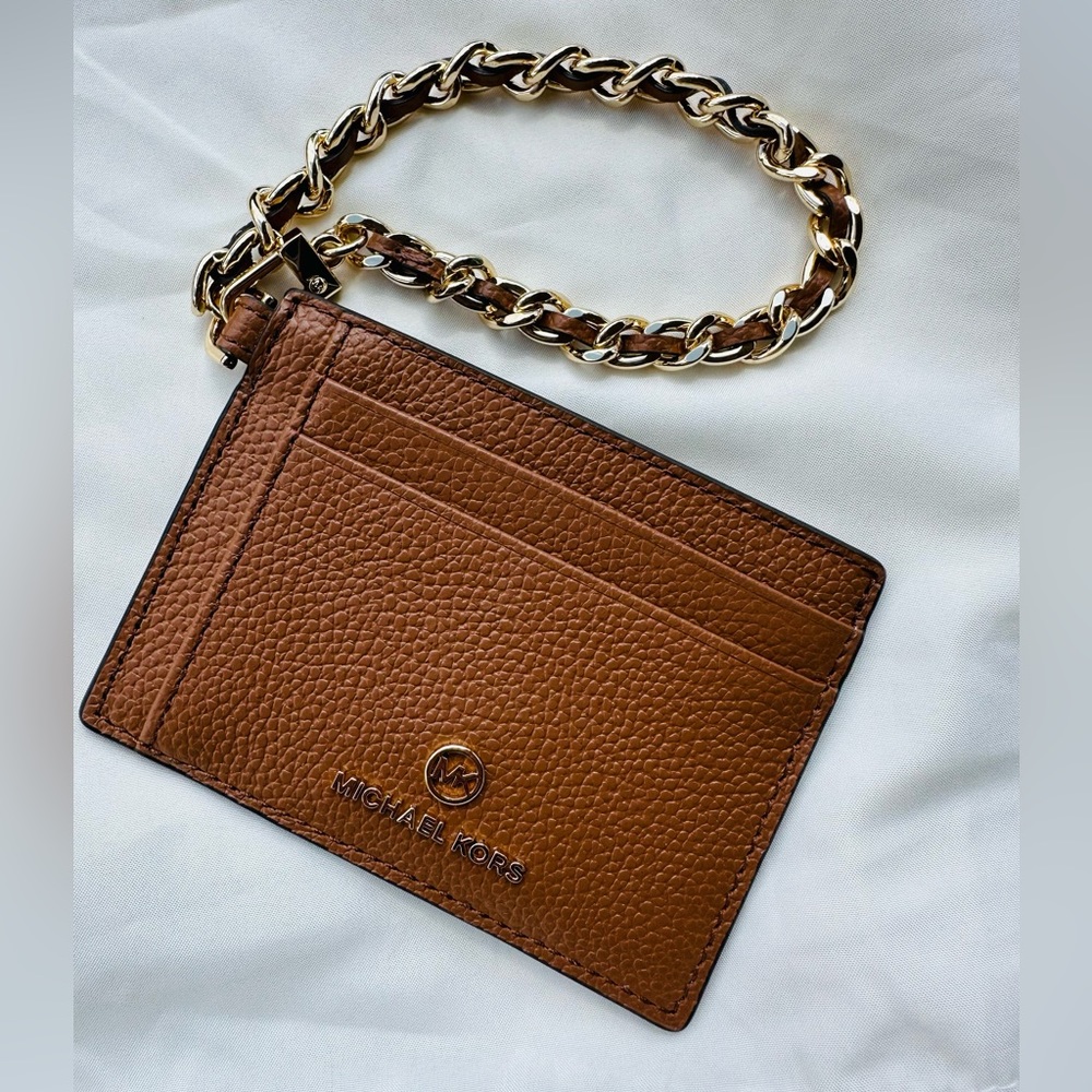 NWOT Michael Kors wrist wallet brown with gold chain.